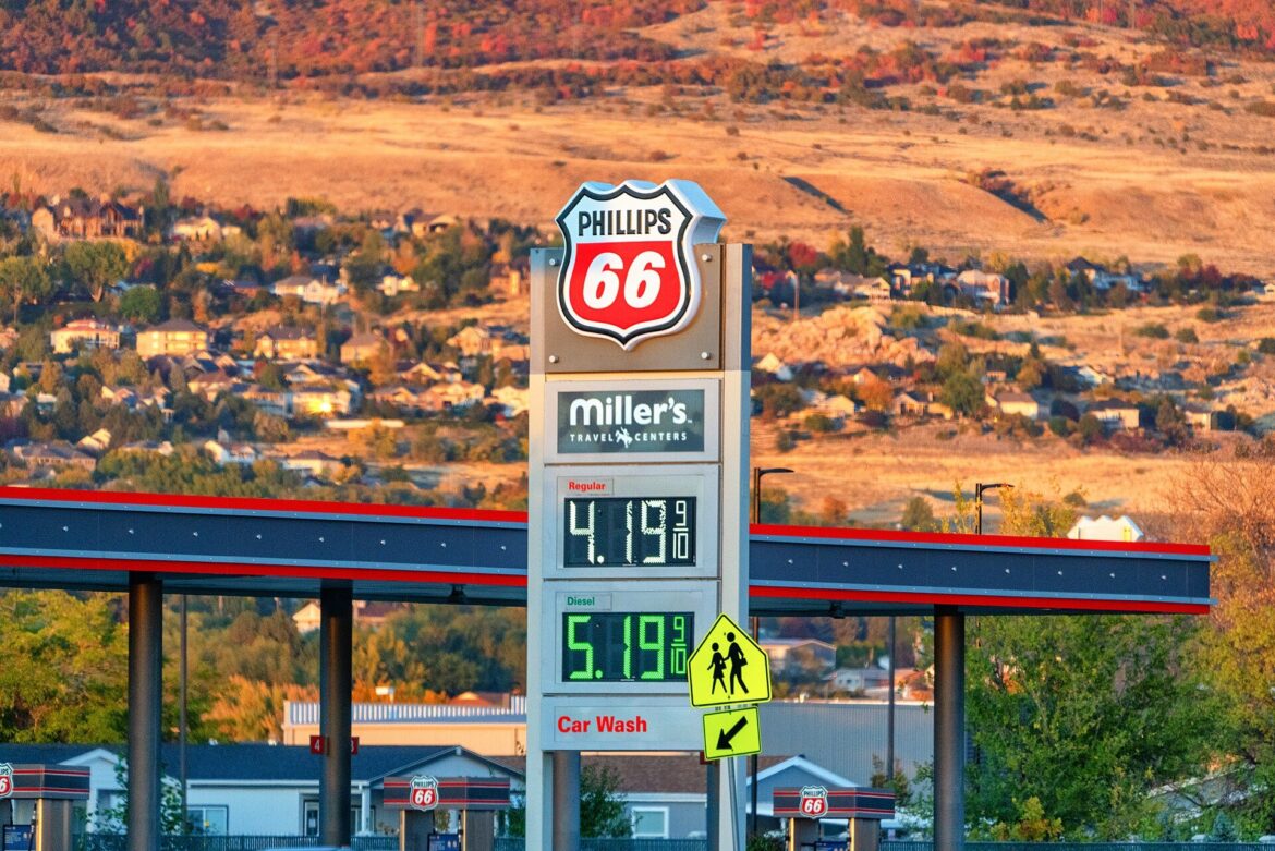 Gas station price sign as gas prices stay high in October 2026