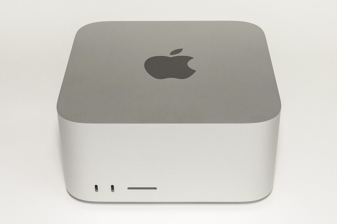 Front view of a silver Apple Mac Studio desktop computer on a white background